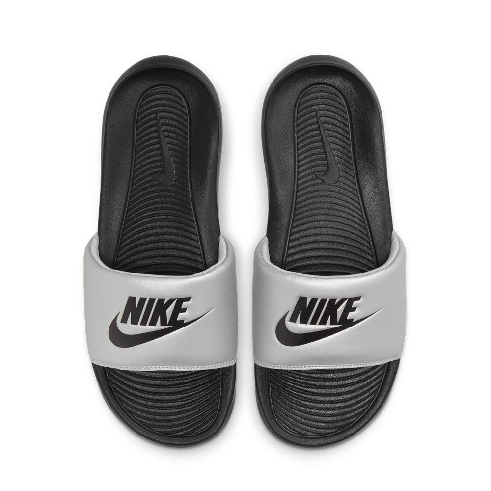 silver nike sliders